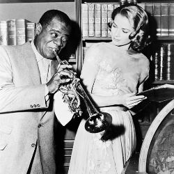 Louis Armstrong and Grace Kelly on the set of High Society 1956
