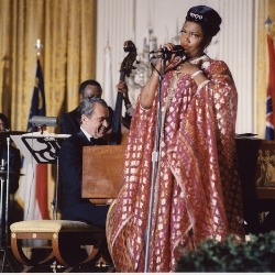 President Richard M. Nixon accompanies Pearl Bailey on the piano